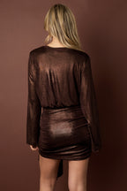 Feestelijke glinsterende wikkeljurk